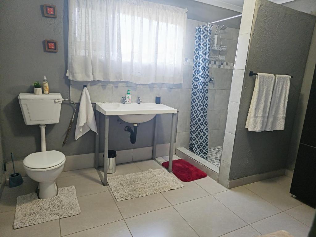 Clean guest bathroom with shower